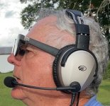 AR_Glasses_Side_WithHeadset.jpg